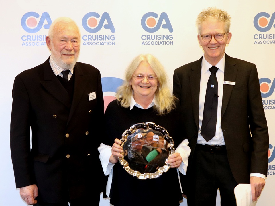 Jane Murphy receiving the Michael Manton Commemorative Plate