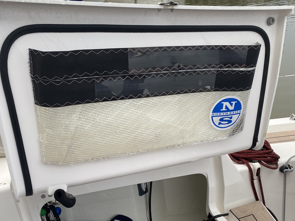 upcycled sail into cockpit locker pocket